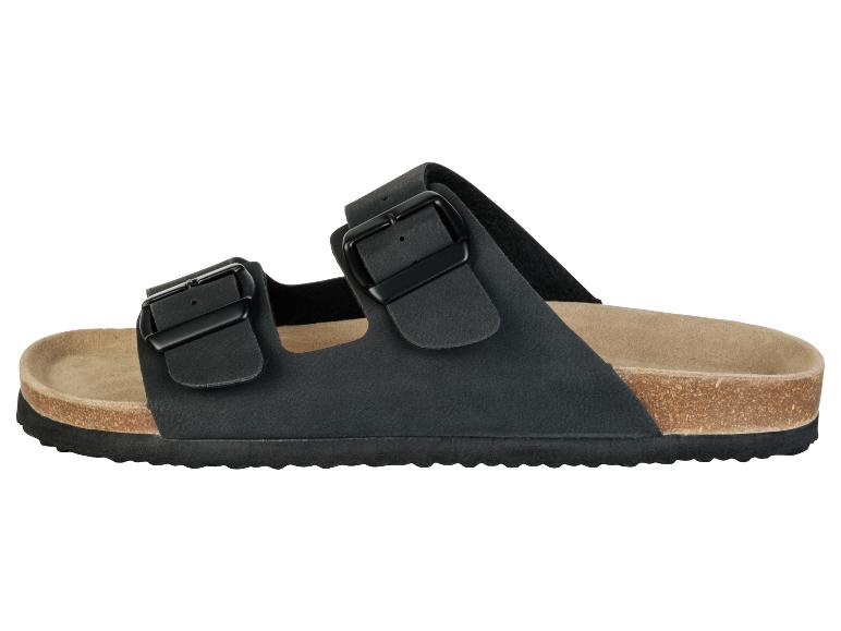 Schwarze Sandalen mit Schnallen und Korksohle.