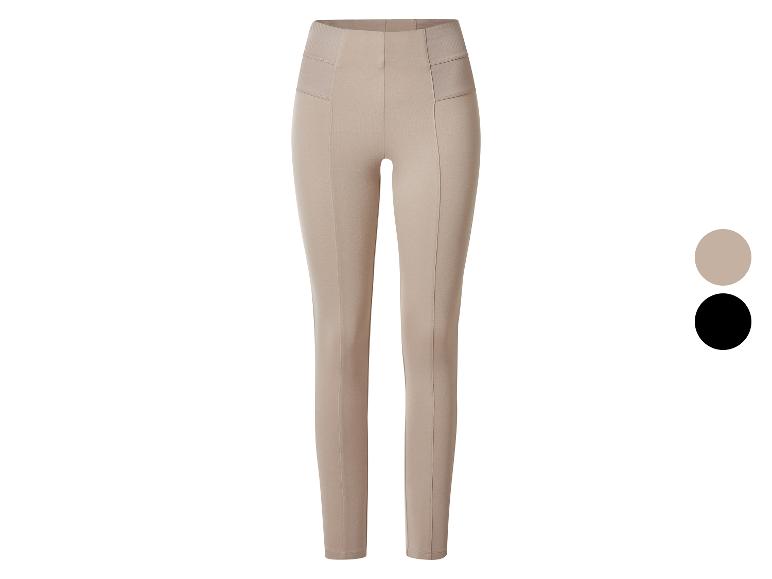Beige Damen-Leggings mit hohem Bund und schwarzen Farbmustern.
