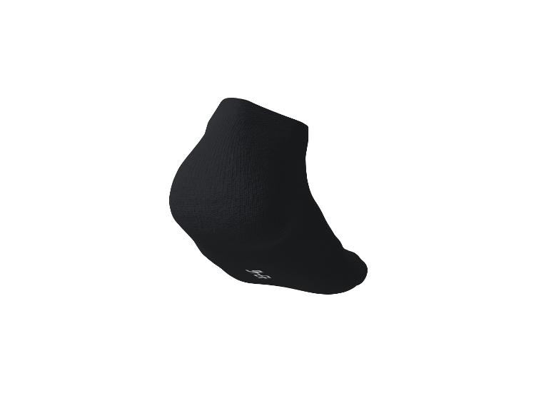 Schwarze Socke mit weißen Details an der Sohle.
