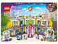 Lego Friends Einkaufszentrum mit verschiedenen Geschäften und Figuren.