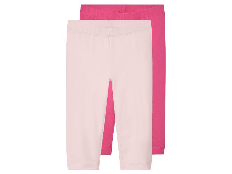 Zwei Paar Mädchen-Leggings in Rosa und Hellrosa.