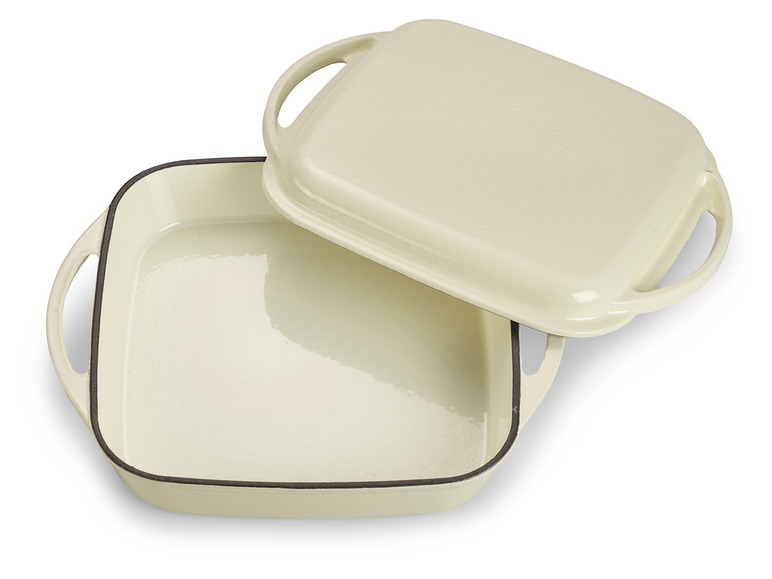 Eine weiße gusseiserne Auflaufform mit Deckel.