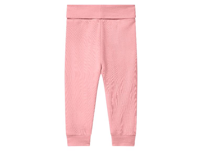 Rosa Babyhose mit breitem, umklappbarem Bund und Rippbündchen.