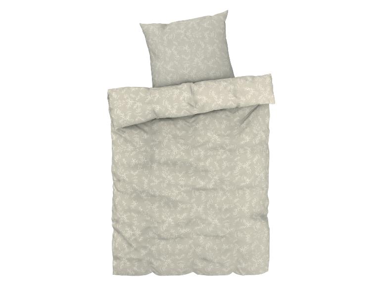 Beige Bettbezug mit weißem Blumenmuster.