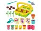 Play-Doh Garten-Set mit Knete, Werkzeugen und Formen zum Gestalten von Blumen.