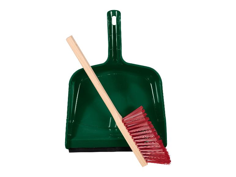 Grüner Schaufel und roter Besen Set.