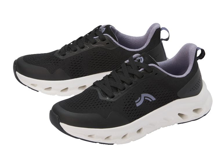 CRIVIT Damen Sportschuhe in Schwarz mit weißer Sohle.