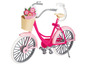 Ein rosafarbenes Fahrrad mit einem Korb und Blumen.