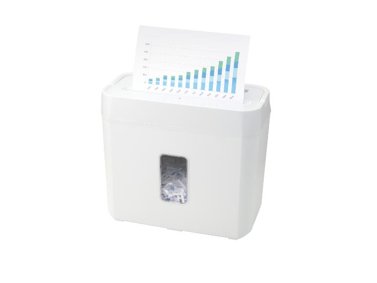 Weißer Aktenvernichter mit einem Diagramm, das in die Öffnung eingeführt wird.