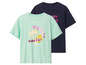 Zwei T-Shirts, ein mintgrünes mit 'Pink Island Paradise' Print und ein dunkelblaues mit 'Secret' Print.