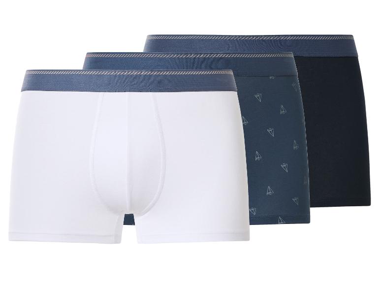 3er-Pack Herren-Boxershorts: weiß, marineblau mit Segelbootmuster und einfarbig marineblau.