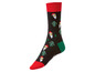 Eine schwarze Socke mit rotem Rand und Weihnachtsmotiv mit Santa Claus und Schneeflocken.
