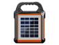 Tragbare Solarlaterne mit Solarpanel und Tragegriff, in Schwarz und Orange.