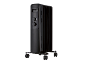 Schwarzer Ölradiator mit Rollen und Drehreglern