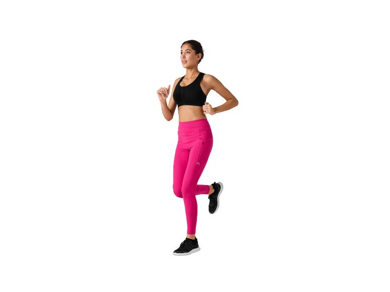 Frau beim Joggen in rosa Leggings und Sport-BH.