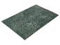 Dunkelgrüner rechteckiger Badteppich mit flauschiger Textur