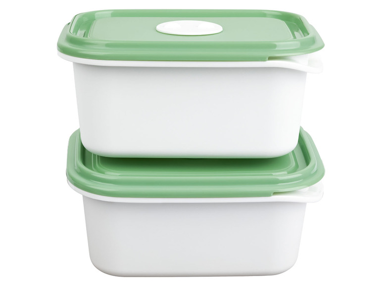 Zwei grüne und weiße Plastik-Aufbewahrungsboxen.