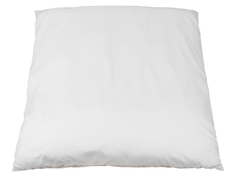 Ein weißes Kissen mit glattem, sauberem Aussehen.
