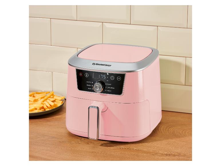 Rosa Heißluftfritteuse mit Pommes Frites, Digitalanzeige zeigt 175 h min.