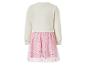 Kinderkleid mit langen Ärmeln, cremefarbenem Oberteil und rosa Rock mit Glitzersternen.