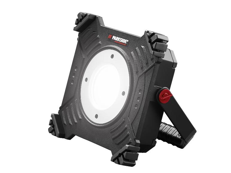Parkside Performance LED-Arbeitsleuchte, schwarz, mit rotem Griff und robuster Basis.