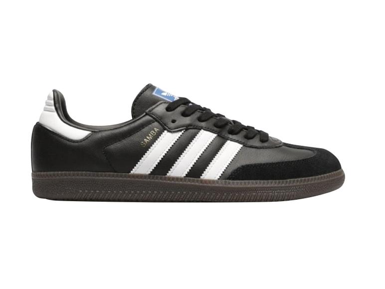 Schwarze Sportschuhe mit drei weißen Streifen und Wildlederdetails.