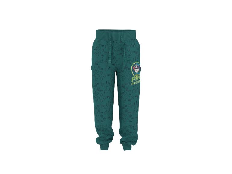 Kinder-Jogginghose in Petrol mit Dinosaurier-Muster und Zeichentrickfigur.