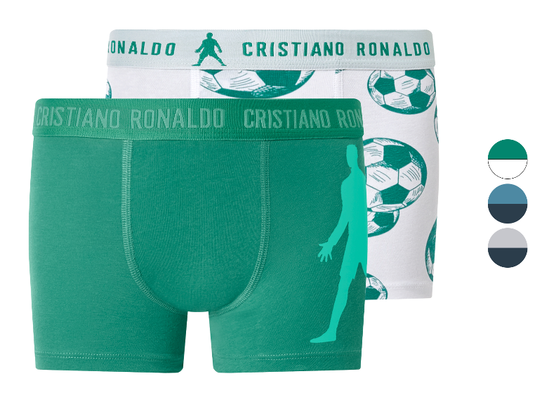 Herren-Boxershorts mit Fußballmuster und Fußballer-Silhouette, in Grün und Weiß.