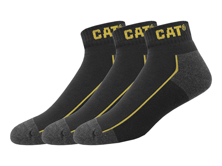Drei Paar schwarze CAT Socken mit gelben Akzenten.