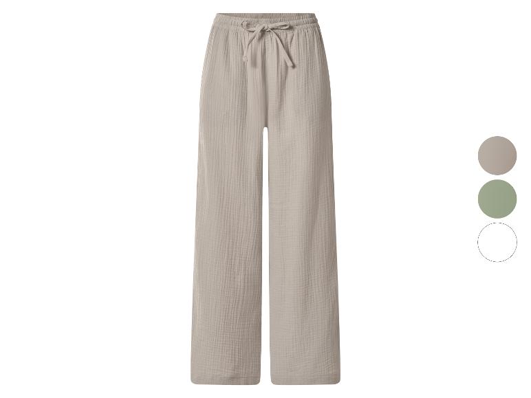 Weite Musselin-Hose in Beige mit verstellbarem Bund und Kordelzug.