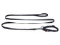 Ein schwarzes Hundehalsband und Leine
