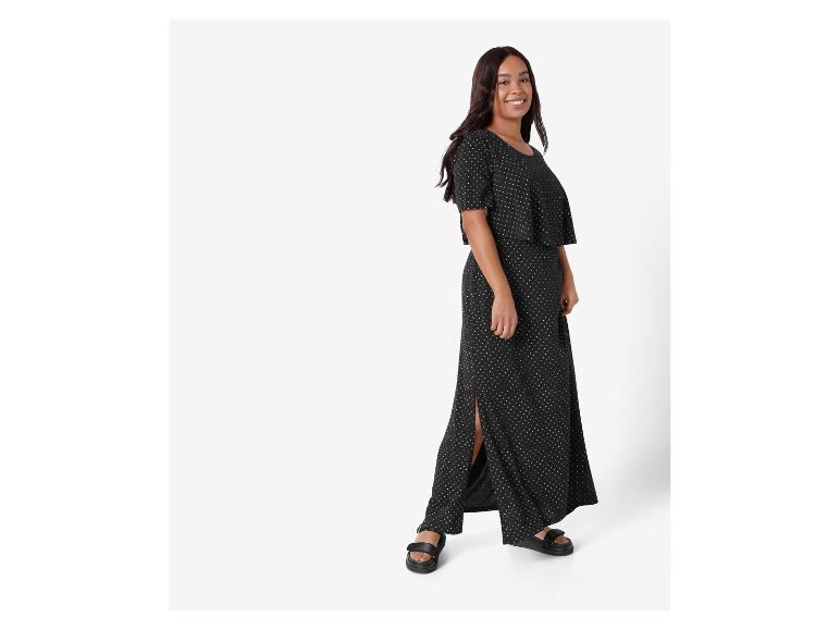 Langes schwarzes Kleid mit Punkten, Boho-Stil.