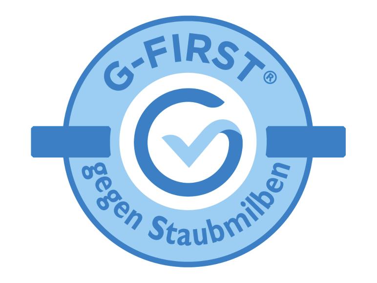 G-FIRST® Logo gegen Staubmilben mit Häkchen-Symbol