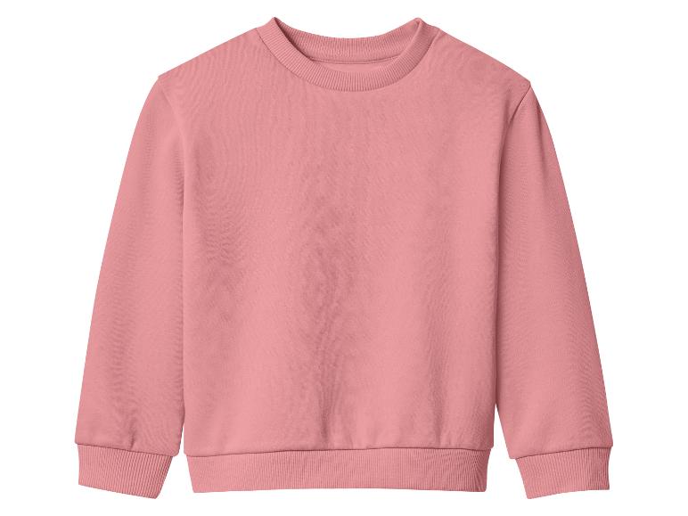 Ein schlichtes rosa Langarm-Sweatshirt mit Rundhalsausschnitt.
