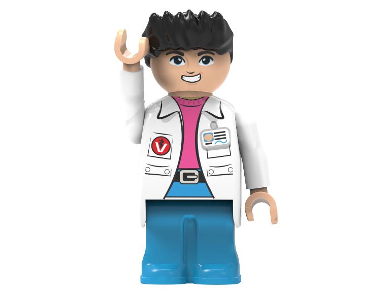 Eine Lego-Figur eines Mannes mit schwarzen Haaren, Brille, Laborkittel und blauer Hose.