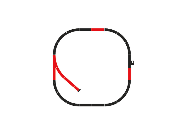 Spielzeugeisenbahnstrecke mit ovaler Hauptstrecke und Abzweigung, teilweise rot markiert.