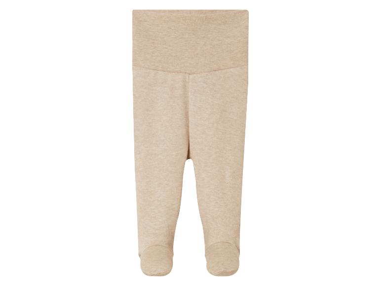 Beige Baby-Leggings mit Füssen.