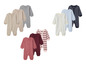 Baby-Bodys in verschiedenen Farben und Mustern.