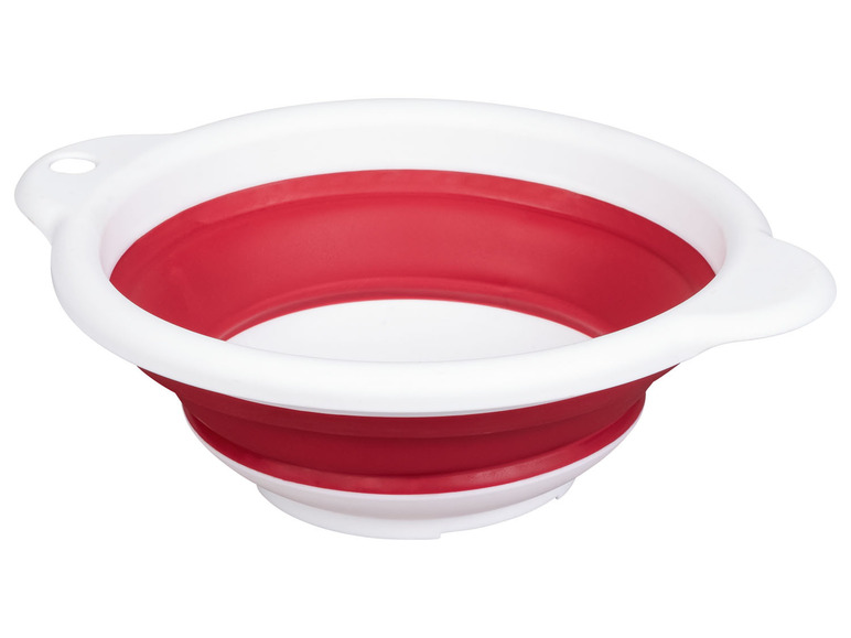 Ein rotes, zusammenklappbares Waschbecken.