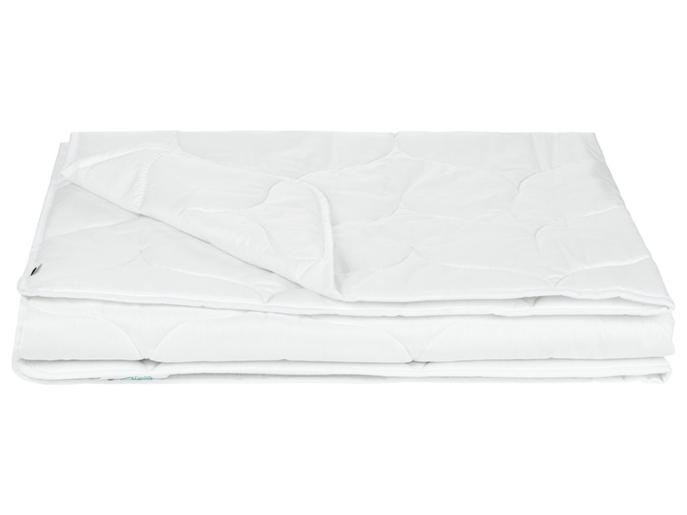 Weißes Bettdecken mit Punktemuster