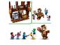 Lego Minecraft Set mit braunem Haus, Minifiguren und großer Piglin-Figur.