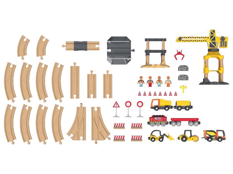 Holzeisenbahn-Set und Baufahrzeuge.