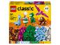 LEGO Classic Creative Dinosaurs Box mit 450 Teilen, zeigt gebaute Dinosaurier und bunte Steine.