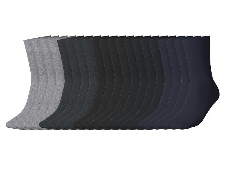 Eine Reihe von 20 Paar Socken in Grau-, Schwarz- und Dunkelblautönen.