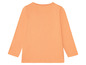 Ein orangefarbenes Langarmshirt für Kinder.