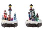 LIVARNO home LED-Weihnachtsdorf-Figuren mit beleuchteten Straßenlaternen und festlichen Szenen.