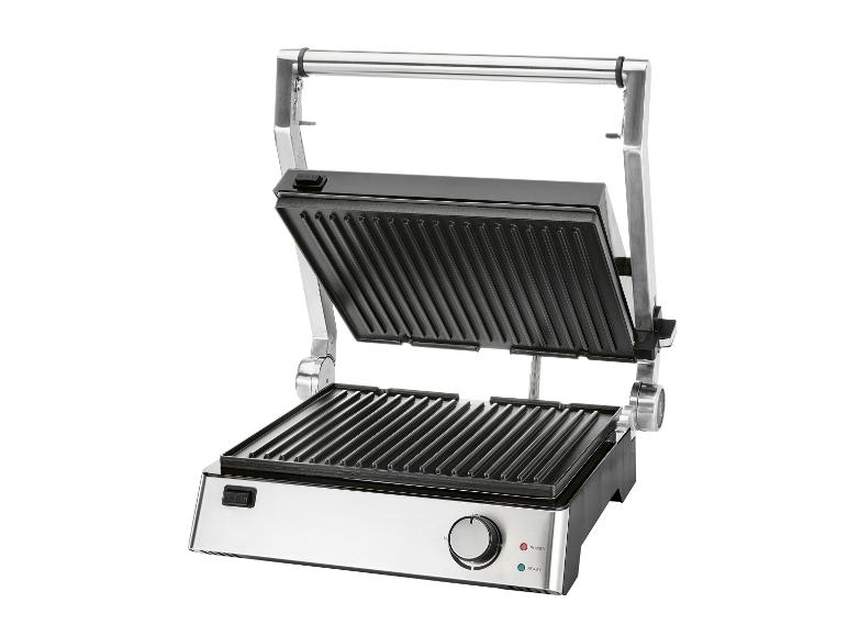 Offener Elektrogrill mit geriffelten Kochplatten und Bedienelementen an der Vorderseite