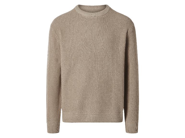 Beiger Strickpullover mit Waffelmuster.