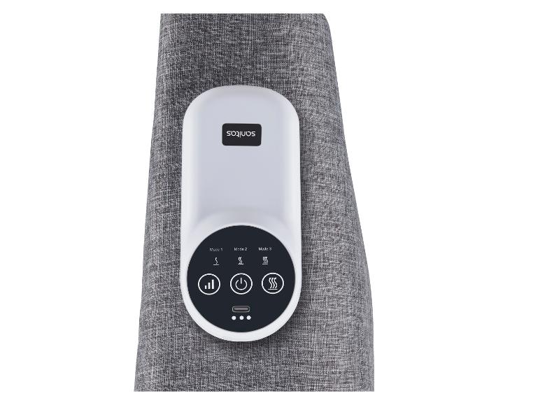Massage-Controller mit Digitalanzeige und Tasten für Modi und Wärme, auf grauem Stoff.