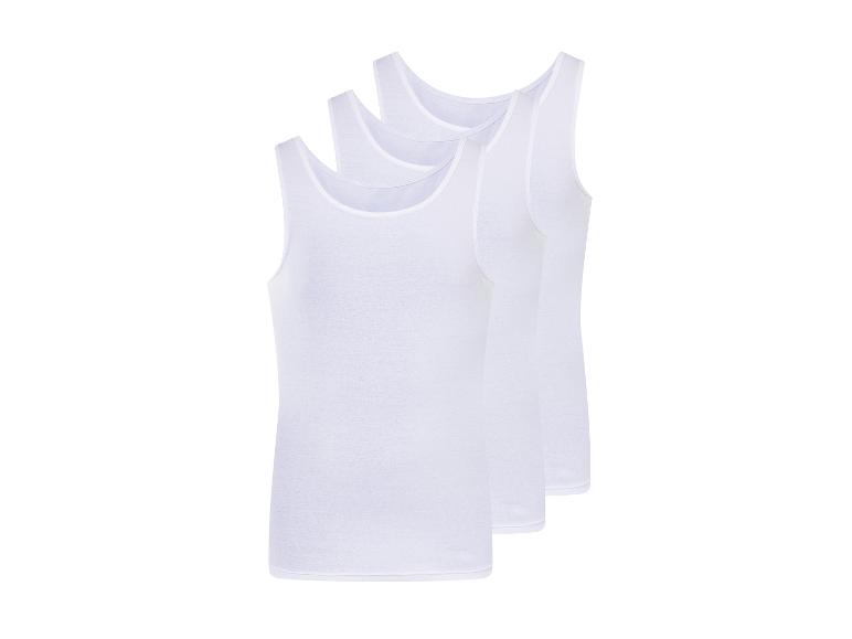 Drei weiße Tanktops.